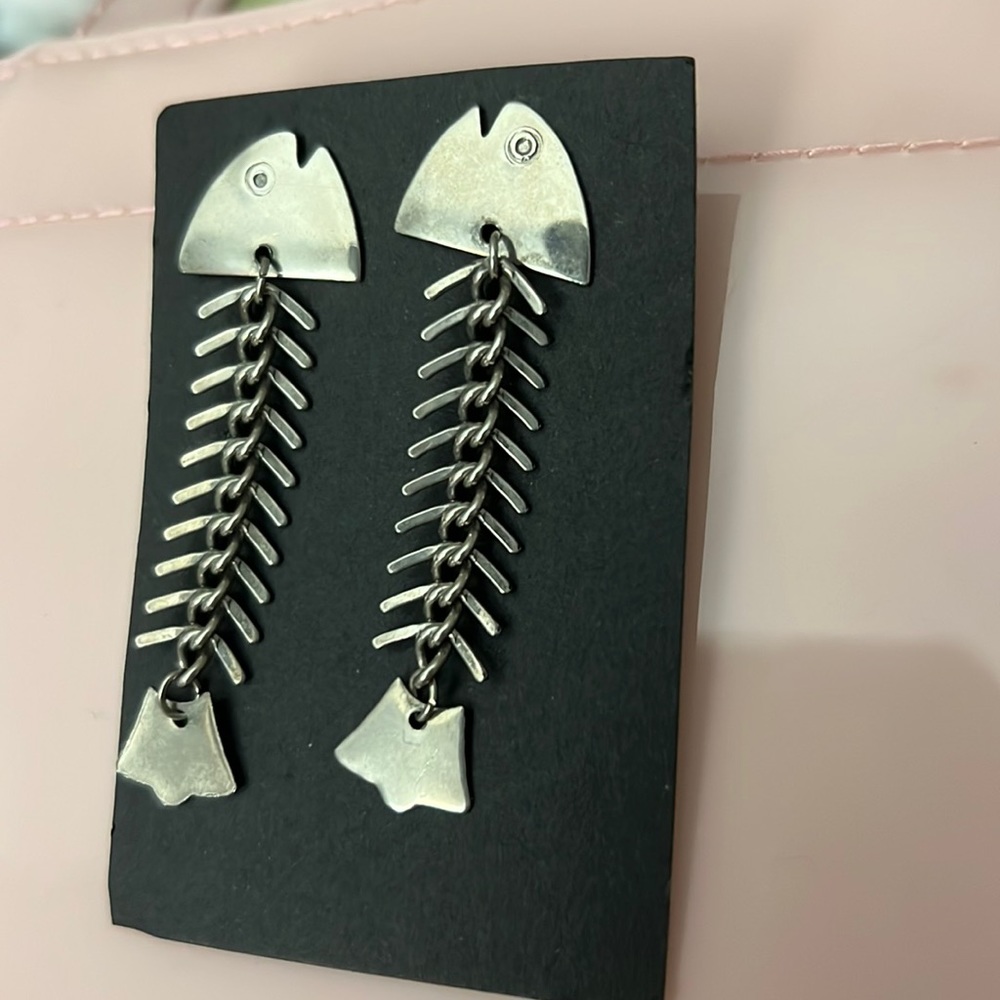 Vintage silver tone articulated fish bone earrings